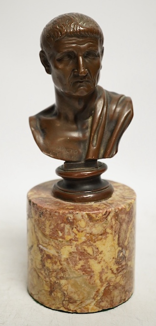 An early 20th century bronze bust of Menander on a marble stand, 19cm. Condition - some minor chips to marble otherwise good